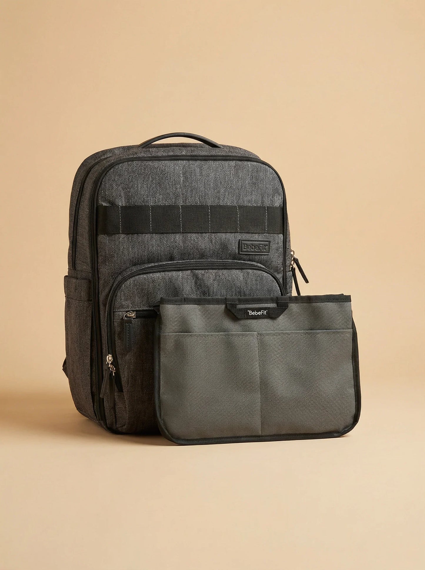 bebefit.eu Carrymate Backpack and Organizer, sleek grey diaper bag set on beige background